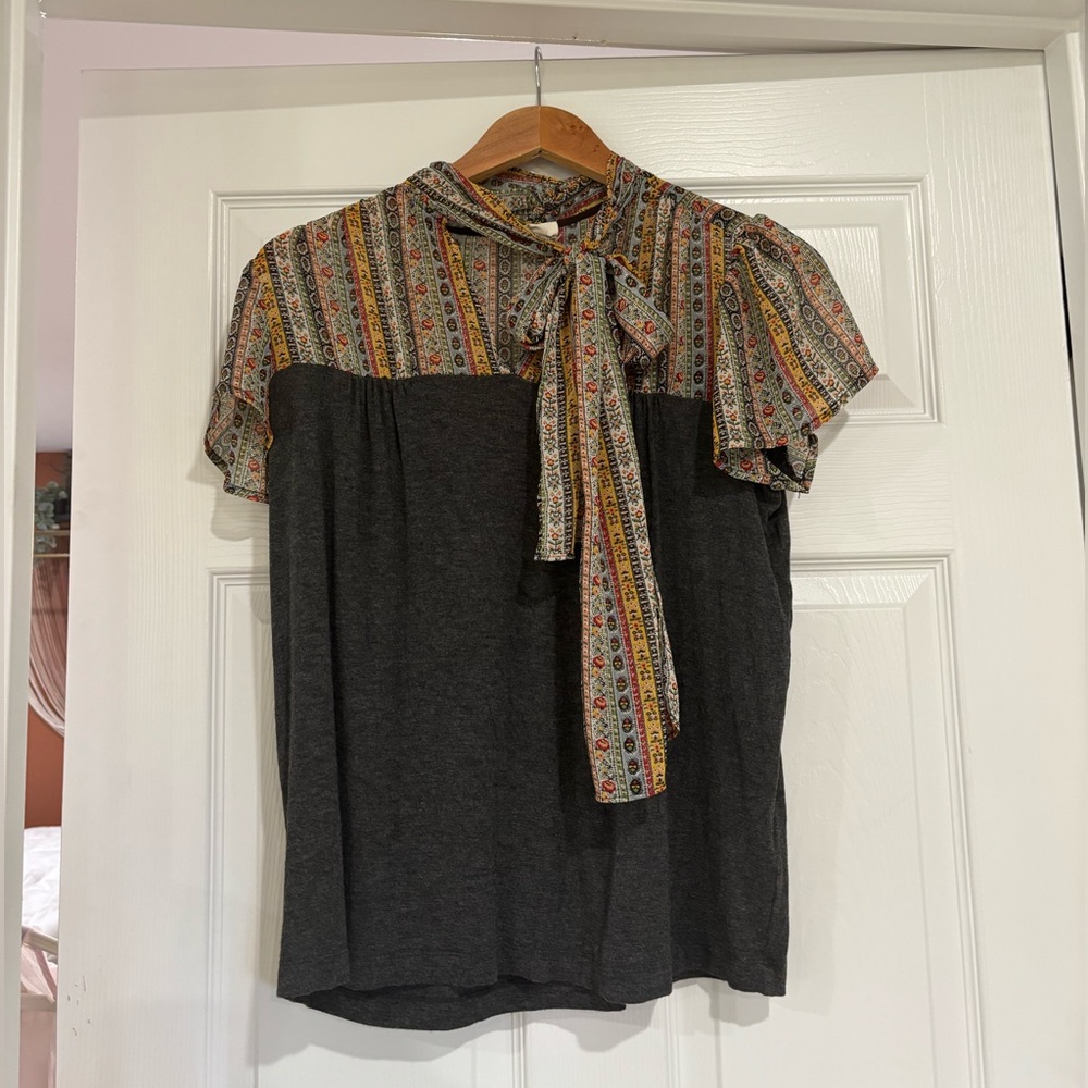 Anthropologie Charcoal Gray Top with Multicolor Patterned Yoke and Bow